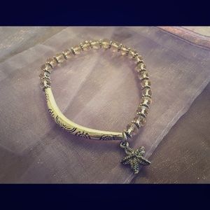 Handmade beaded bracelet with charm